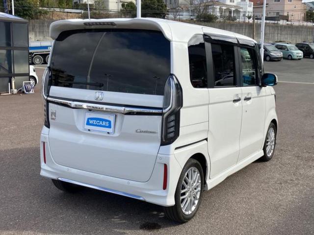 Ｎ－ＢＯＸカスタム Ｌ・ターボ　新品タイヤ／保証書／社外　１１インチ　ＳＤナビ／フリップダウンモニター　社外　１２．８インチ／衝突安全装置／両側電動スライドドア／シートヒーター／車線逸脱防止支援システム／シート　合皮　ターボ　ＥＴＣ（3枚目）