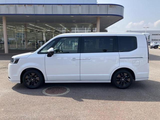 ステップワゴン スパーダ 保証書/社外 9インチ メモリーナビ/ホンダセンシング/両側電動スライドドア/シートヒーター 前席/車線逸脱防止支援システム/シート ハーフレザー/電動バックドア/登録済未使用車 衝突被害軽減システム(2枚目)