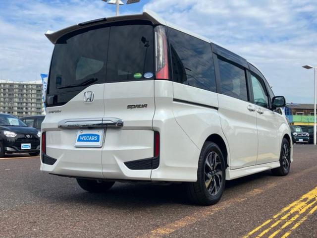 ステップワゴンスパーダ スパーダ・ホンダセンシング　保証書／純正　１０インチ　ＳＤナビ／衝突安全装置／両側電動スライドドア／車線逸脱防止支援システム／ドライブレコーダー　前後／ヘッドランプ　ＬＥＤ／ＵＳＢジャック／Ｂｌｕｅｔｏｏｔｈ接続／ＥＴＣ（3枚目）