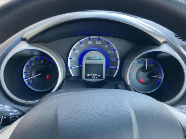 フィットハイブリッド ハイブリッド・スマートセレクション　保証書／純正　ＨＤＤナビ／Ｂｌｕｅｔｏｏｔｈ接続／ＥＴＣ／ＥＢＤ付ＡＢＳ／アイドリングストップ／バックモニター／ワンセグＴＶ／エアバッグ　運転席／エアバッグ　助手席／パワーウインドウ　バックカメラ（14枚目）