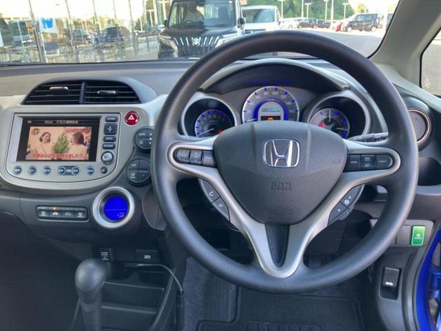 フィットハイブリッド ハイブリッド・スマートセレクション　保証書／純正　ＨＤＤナビ／Ｂｌｕｅｔｏｏｔｈ接続／ＥＴＣ／ＥＢＤ付ＡＢＳ／アイドリングストップ／バックモニター／ワンセグＴＶ／エアバッグ　運転席／エアバッグ　助手席／パワーウインドウ　バックカメラ（15枚目）