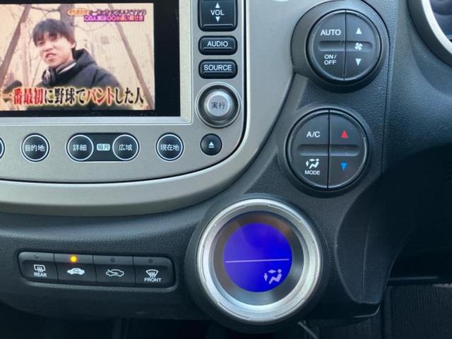 フィットハイブリッド ハイブリッド・スマートセレクション　保証書／純正　ＨＤＤナビ／Ｂｌｕｅｔｏｏｔｈ接続／ＥＴＣ／ＥＢＤ付ＡＢＳ／アイドリングストップ／バックモニター／ワンセグＴＶ／エアバッグ　運転席／エアバッグ　助手席／パワーウインドウ　バックカメラ（32枚目）