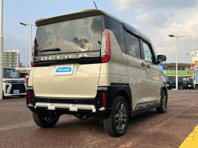 デリカミニ ４ＷＤ　Ｔプレミアム　保証書／社外　９インチ　ＳＤナビ／デジタルインナーミラー／イーアシスト（ミツビシ）／両側電動スライドドア／シートヒーター　前席／全方位モニター／車線逸脱防止支援システム／シート　ハーフレザー　４ＷＤ（3枚目）