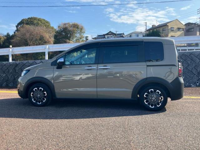 フリード eHEVクロスター 新品タイヤ/保証書/純正 11インチ SDナビ/ホンダセンシング/両側電動スライドドア/シートヒーター/マルチビューカメラシステム/車線逸脱防止支援システム/シート ハーフレザー 衝突被害軽減システム(2枚目)