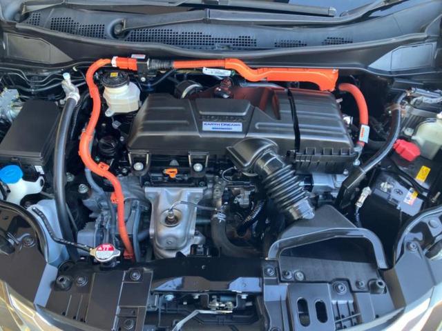 オデッセイハイブリッド ハイブリッドアブソルート・ＥＸホンダセンシング　保証書／純正　ＳＤナビ／フリップダウンモニター／衝突安全装置／両側電動スライドドア／シートヒーター／マルチビューカメラシステム／車線逸脱防止支援システム／シート　ハーフレザー　衝突被害軽減システム（52枚目）