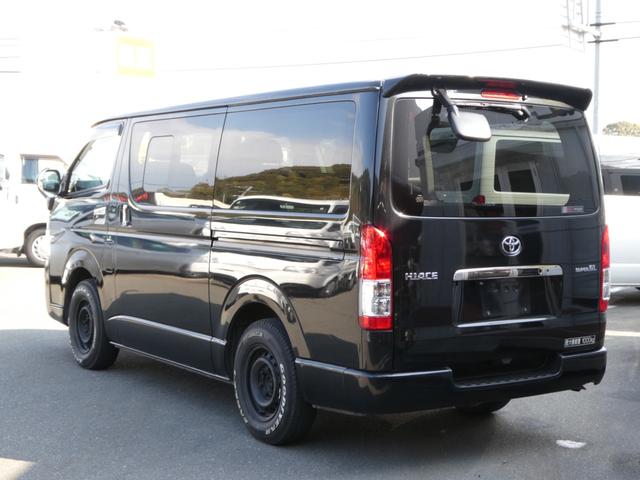 ハイエースバン スーパーＧＬ　ダークプライム　１年間１万キロ無償保証　４型　ＢＴ対応ナビ　バックカメラ　フルセグＴＶ　ＥＴＣ　スマートキー　ベッドキット　スライドレール　シートカバー　ホワイトレター　ＬＥＤヘッド　オートライト　フォグランプ（34枚目）