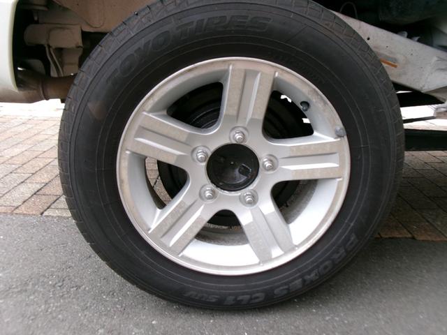 ジムニー ワイルドウインド　５速ＭＴ　リフトアップ　社外ＨＫＳマフラー　純正アルミホイール　社外ナビ　地デジＴＶ　Ｂカメラ　前後ドライブレコーダー　タイミングチェーン（3枚目）