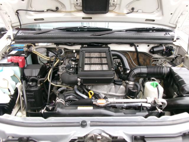 ジムニー ワイルドウインド　５速ＭＴ　リフトアップ　社外ＨＫＳマフラー　純正アルミホイール　社外ナビ　地デジＴＶ　Ｂカメラ　前後ドライブレコーダー　タイミングチェーン（15枚目）