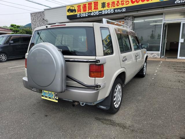 ラシーン タイプＭ　最終型　特別仕様車　羅針盤デザインシート　木目調パネル　背面タイヤ＆ハードカバー　ルーフレール　ＥＴＣ　タイミングチェーン式　キーレス　ＣＤステレオ　４ＷＤ　日産ディーラー仕入れ（2枚目）