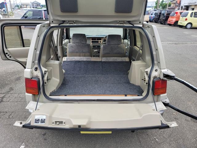 ラシーン タイプＭ　最終型　特別仕様車　羅針盤デザインシート　木目調パネル　背面タイヤ＆ハードカバー　ルーフレール　ＥＴＣ　タイミングチェーン式　キーレス　ＣＤステレオ　４ＷＤ　日産ディーラー仕入れ（12枚目）