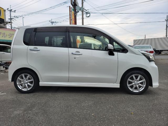 ムーヴ カスタム　Ｘ　後期型　ストラーダＳＤナビフルセグＴＶ　Ｂｌｕｅｔｏｏｔｈ接続　ＥＴＣ　ＨＩＤライト　禁煙車　純正フルエアロ　アイドリングストップ　プッシュスタート　スマートキー　ディーラー仕入れ（9枚目）