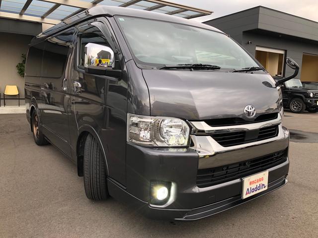 ハイエースバン スーパーGL ダークプライムII ワンオーナー 11インチナビ 地デジ パノラミックビューモニター LEDヘッドライト トヨタセーフティーセンス 両側パワースライドドア BLITZスポイラー ゲンブローダウン BACK9フェンダー(2枚目)