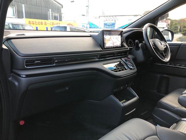 オデッセイハイブリッド ｅ：ＨＥＶアブソルート・ＥＸブラックエディション　ワンオーナー　純正９型ナビ　地デジ　マルチビューカメラ　ＬＥＤヘッドライト　ホンダセンシング　ブラインドスポットインフォメーション　パワーテールゲート　２列目シートヒーター　ワイヤレス充電器　ＥＴＣ（10枚目）