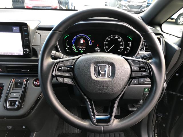 オデッセイハイブリッド ｅ：ＨＥＶアブソルート・ＥＸブラックエディション　ワンオーナー　純正９型ナビ　地デジ　マルチビューカメラ　ＬＥＤヘッドライト　ホンダセンシング　ブラインドスポットインフォメーション　パワーテールゲート　２列目シートヒーター　ワイヤレス充電器　ＥＴＣ（16枚目）