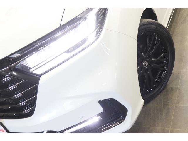 オデッセイハイブリッド ｅ：ＨＥＶアブソルート・ＥＸブラックエディション　新車保証継承付　ホンダコネクト１１．４ｉｎナビ　１５．６ｉｎ後席モニター　デジタルルームミラー　本革　フルセグ　全周囲カメラ　　両側電動スライドドア　サイドステップガーニッシュ　前後ドラレコ（43枚目）