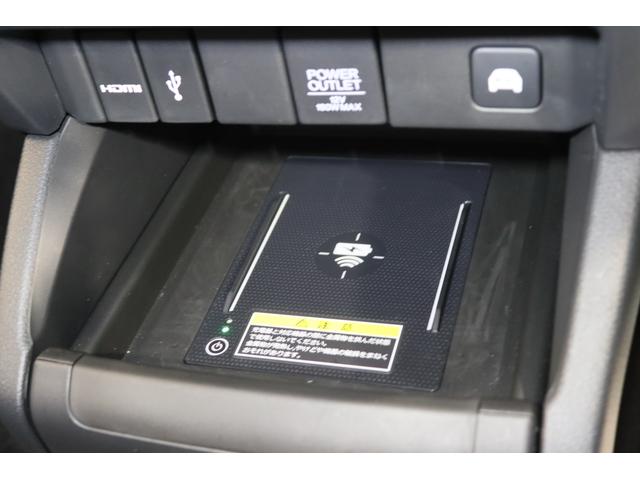 オデッセイハイブリッド ｅ：ＨＥＶアブソルート・ＥＸブラックエディション　新車保証継承付　ワンオーナー　禁煙車　後席モニター　本革シート　全周囲カメラ　メモリーナビ　フルセグ　ホンダセンシング　ＥＴＣ　オットマンシート　両側電動スライドドア　ＬＥＤヘッドライト　１８ＡＷ（27枚目）