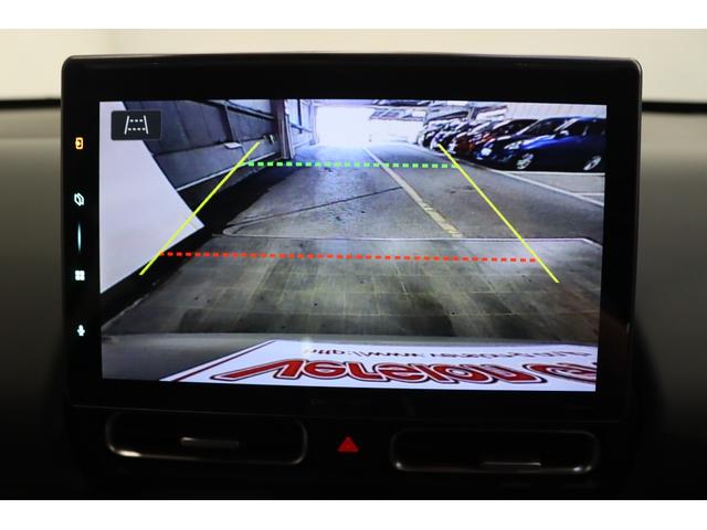 フリード ｅ：ＨＥＶクロスター　新車保証継承付　社外ディスプレイオーディオ　バックカメラ　レーダークルコン　クリアランスソナー　レーンアシスト　衝突被害軽減　ＢＳＭ　ＥＴＣ　社外ドラレコ　シートヒーター　両側電動スライド　１５ＡＷ（14枚目）