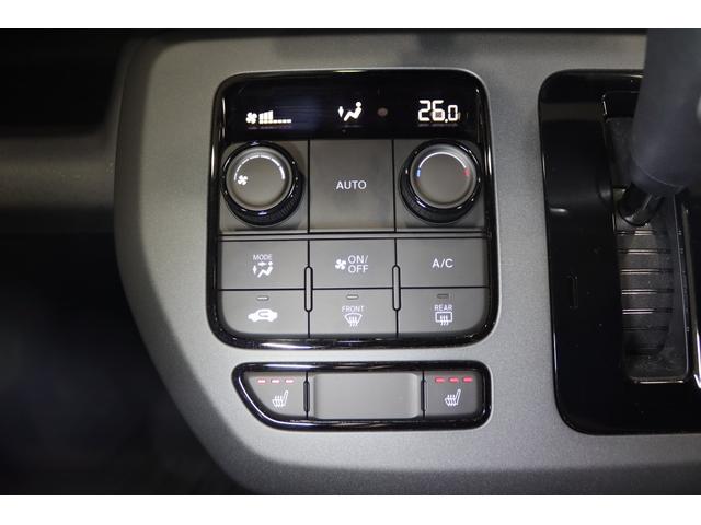 フリード ｅ：ＨＥＶクロスター　新車保証継承付　社外ディスプレイオーディオ　バックカメラ　レーダークルコン　クリアランスソナー　レーンアシスト　衝突被害軽減　ＢＳＭ　ＥＴＣ　社外ドラレコ　シートヒーター　両側電動スライド　１５ＡＷ（27枚目）