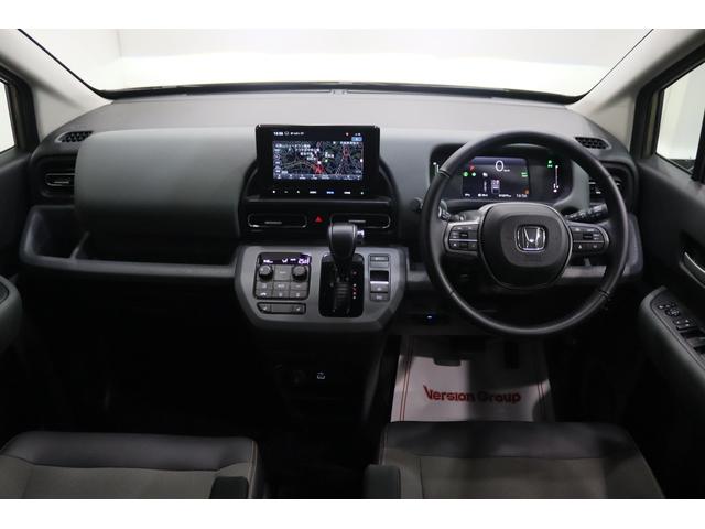 フリード e:HEVクロスター 新車保証継承付 ワンオーナー 禁煙車 メモリーナビ フルセグ バックカメラ OPカラー:デザートベージュパール レーダークルコン クリアランスソナー 衝突被害軽減 踏み間違い防止 BSM ETC(9枚目)