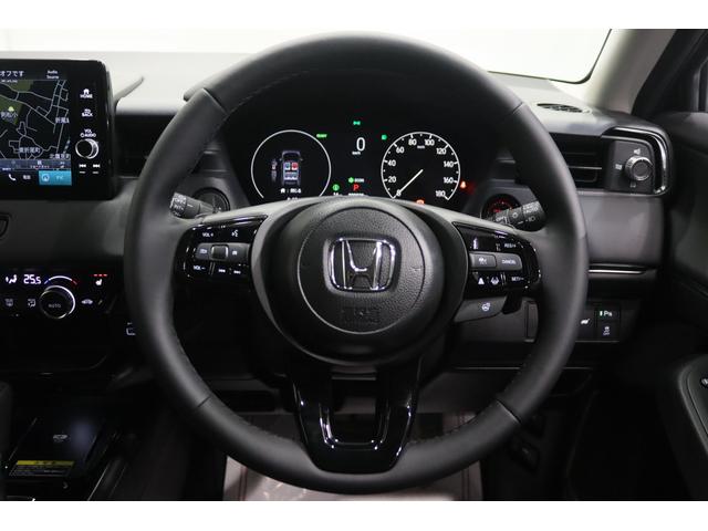 ヴェゼル ｅ：ＨＥＶ　Ｚ　新車保証継承付　ディスプレイオーディオ　バックカメラ　レーダークルーズコントロール　クリアランスソナー　衝突被害軽減　踏み間違い防止　ＢＳＭ　ワイヤレス充電　シートヒーター　パワーバックドア　１８ＡＷ（29枚目）