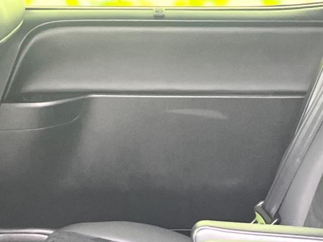 ヴォクシー ＺＳキラメキ３　新品タイヤ／純正エアロ／保証書／純正　１０インチ　ＳＤナビ／フリップダウンモニター　純正　１２．８インチ／衝突安全装置／両側電動スライドドア／車線逸脱防止支援システム／シート　ハーフレザー　フルエアロ（23枚目）