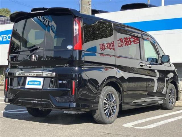 ステップワゴン ｅＨＥＶモデューロＸホンダセンシング　新品タイヤ／保証書／純正　１０インチ　ＳＤナビ／衝突安全装置／両側電動スライドドア／シートヒーター／マルチビューカメラシステム／車線逸脱防止支援システム／シート　ハーフレザー／ドライブレコーダー　純正（3枚目）