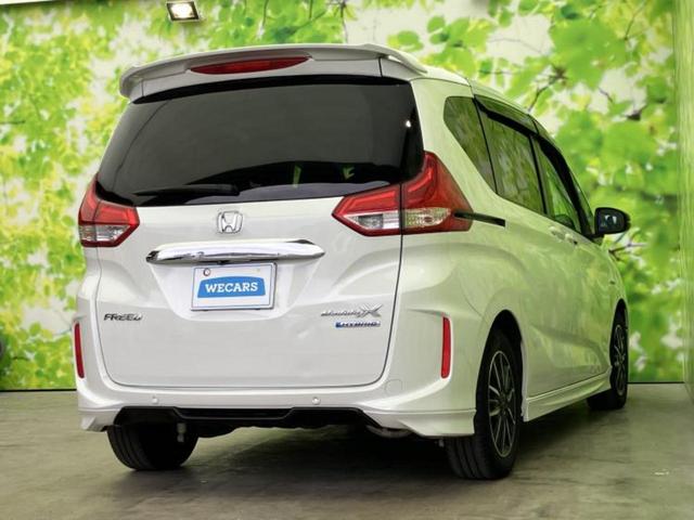 フリードハイブリッド ハイブリッドモデューロＸホンダセンシング　新品タイヤ／保証書／純正　９インチ　ＳＤナビ／衝突安全装置／両側電動スライドドア／車線逸脱防止支援システム／ドライブレコーダー　前後／ヘッドランプ　ＬＥＤ／Ｂｌｕｅｔｏｏｔｈ接続／ＥＴＣ　バックカメラ（3枚目）