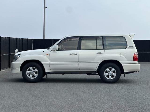 ランドクルーザー１００ ＶＸリミテッド　４．２Ｌディーゼルターボ　ＳＲ　純正ナビ　ウッドコンビステア　純正アルミホイール　シートカバー　クルーズコントロール　電動格納ドアミラー　ヘッドライトウォッシャー（3枚目）