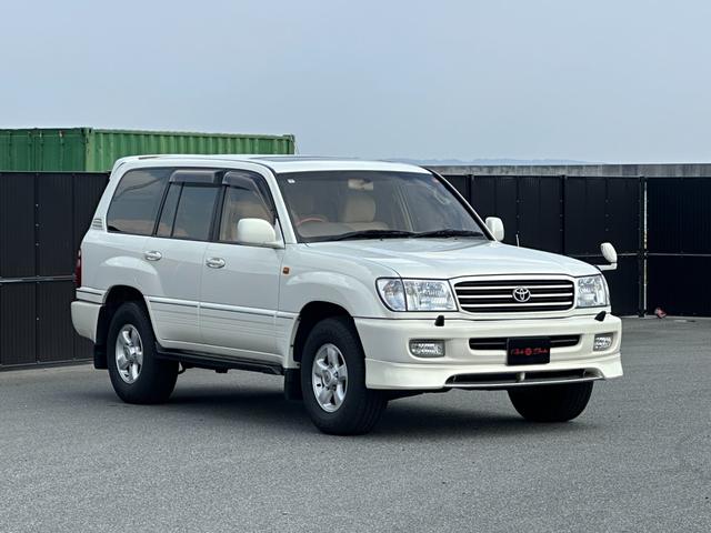 ランドクルーザー１００ ＶＸリミテッド　４．２Ｌディーゼルターボ　ＳＲ　純正ナビ　ウッドコンビステア　純正アルミホイール　シートカバー　クルーズコントロール　電動格納ドアミラー　ヘッドライトウォッシャー（7枚目）