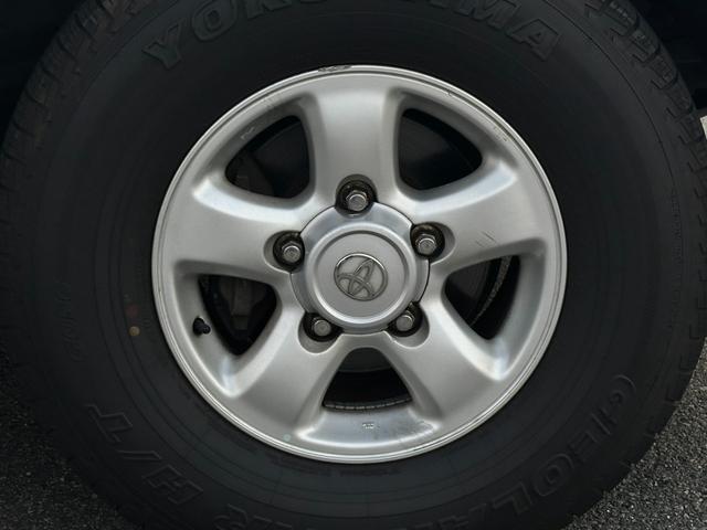 ランドクルーザー１００ ＶＸリミテッド　４．２Ｌディーゼルターボ　ＳＲ　純正ナビ　ウッドコンビステア　純正アルミホイール　シートカバー　クルーズコントロール　電動格納ドアミラー　ヘッドライトウォッシャー（14枚目）