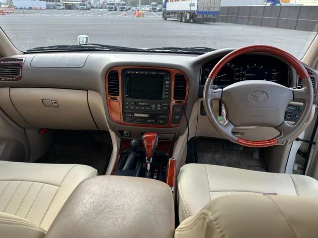 ランドクルーザー１００ ＶＸリミテッド　４．２Ｌディーゼルターボ　ＳＲ　純正ナビ　ウッドコンビステア　純正アルミホイール　シートカバー　クルーズコントロール　電動格納ドアミラー　ヘッドライトウォッシャー（16枚目）