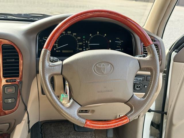 ランドクルーザー１００ ＶＸリミテッド　４．２Ｌディーゼルターボ　ＳＲ　純正ナビ　ウッドコンビステア　純正アルミホイール　シートカバー　クルーズコントロール　電動格納ドアミラー　ヘッドライトウォッシャー（23枚目）