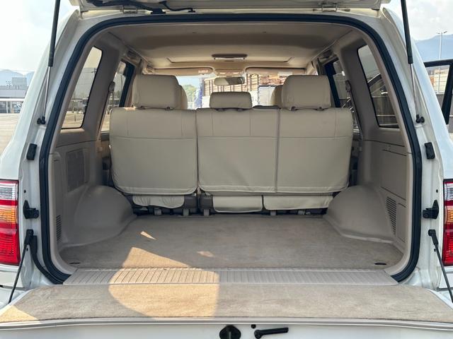 ランドクルーザー１００ ＶＸリミテッド　４．２Ｌディーゼルターボ　ＳＲ　純正ナビ　ウッドコンビステア　純正アルミホイール　シートカバー　クルーズコントロール　電動格納ドアミラー　ヘッドライトウォッシャー（31枚目）