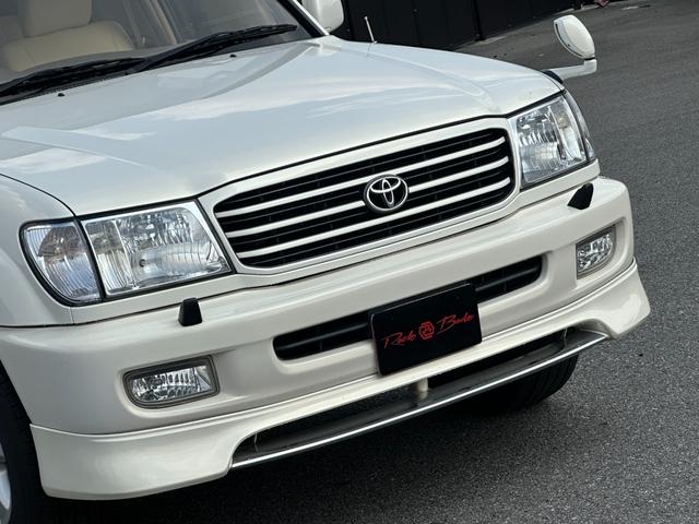 ランドクルーザー１００ ＶＸリミテッド　４．２Ｌディーゼルターボ　ＳＲ　純正ナビ　ウッドコンビステア　純正アルミホイール　シートカバー　クルーズコントロール　電動格納ドアミラー　ヘッドライトウォッシャー（32枚目）