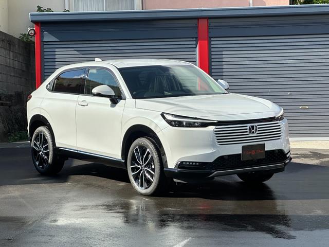 ヴェゼル ｅ：ＨＥＶ　Ｚ　ホンダコネクトｆｏｒＧａｔｈｅｒｓ＋ナビ装着用ＰＫＧ　ホンダセンシング　電動テールゲート　Ｂカメラ　ＢＳＭ　パークセンサー　アダプティブクルコン　コンビシート　ステア＆シートヒーター　１８ｉｎＡＷ（7枚目）