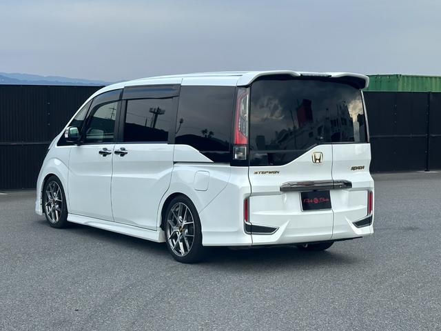 ステップワゴンスパーダ スパーダ・クールスピリット　ホンダセンシング　７人乗　リアエンターテイメント　９型ナビＴＶ　ＴＥＩＮ車高調　無限フロントスポイラー　社外１８ｉｎＡＷ　両側電動スライドドア　ホンダセンシング　ハーフレザーシート　Ｂカメラ　ＥＴＣ　ＬＥＤヘッドランプ（5枚目）