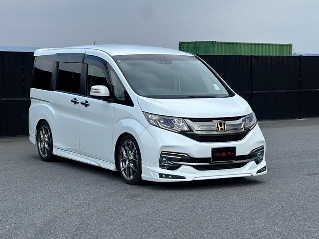 ステップワゴンスパーダ スパーダ・クールスピリット　ホンダセンシング　７人乗　リアエンターテイメント　９型ナビＴＶ　ＴＥＩＮ車高調　無限フロントスポイラー　社外１８ｉｎＡＷ　両側電動スライドドア　ホンダセンシング　ハーフレザーシート　Ｂカメラ　ＥＴＣ　ＬＥＤヘッドランプ（7枚目）