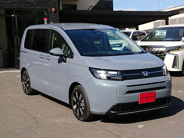 フリード e:HEVエアー EX ホンダセンシング ナビ装着用PKG 両側電動スライドドア Bカメラ アダプティブクルコン BSM パークセンサー コンビシート シートヒーター フルLEDヘッドランプ オートハイビーム リアクーラー(7枚目)