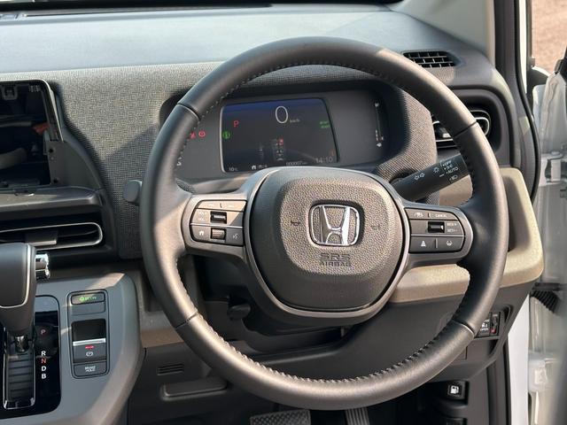 フリード ｅ：ＨＥＶエアー　ＥＸ　ホンダセンシング　ナビ装着用ＰＫＧ　両側電動スライドドア　Ｂカメラ　アダプティブクルコン　ＢＳＭ　パークセンサー　コンビシート　シートヒーター　フルＬＥＤヘッドランプ　オートハイビーム　リアクーラー（19枚目）