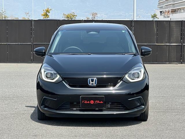 フィット ｅ：ＨＥＶホーム　ホンダセンシング　ＨｏｎｄａＣＯＮＮＥＣＴ＋ナビ装着用スペシャルパッケージ　純正９型ナビＴＶ　Ｂカメラ　コンフォートビューＰＫＧ　アダプティブクルコン　ＥＴＣ　ハーフレザー　ＬＥＤヘッドランプ（12枚目）