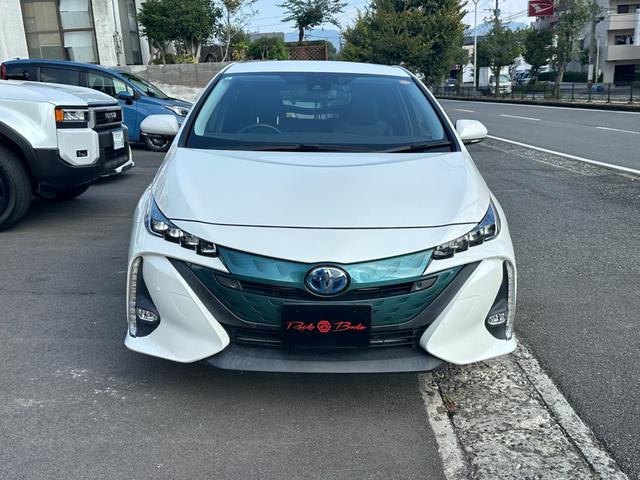 プリウスＰＨＶ Ａプレミアム　１１．６型ナビＴＶ　Ｂカメラ　黒革　シートヒーター　パワーシート　ＨＵＤ　ＢＳＭ　アクセサリーコンセント　トヨタセーフティセンス　ＬＥＤヘッドランプ　アダプティブハイビーム　インテリパークアシスト（12枚目）