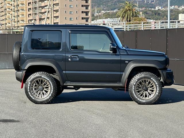 ジムニーシエラ ＪＣ　社外８型ナビＴＶ　Ｂカメラ　ショウワガレージリフトアップキット　ラテラルロッド　社外１６ｉｎＡＷ＆オープンカントリーＲ／Ｔタイヤ　社外テール＆グリル　シートヒーター　マッドフラップ　ブレーキサポート（9枚目）