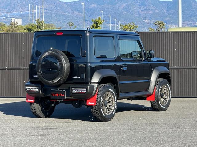 ジムニーシエラ ＪＣ　社外８型ナビＴＶ　Ｂカメラ　ショウワガレージリフトアップキット　ラテラルロッド　社外１６ｉｎＡＷ＆オープンカントリーＲ／Ｔタイヤ　社外テール＆グリル　シートヒーター　マッドフラップ　ブレーキサポート（11枚目）