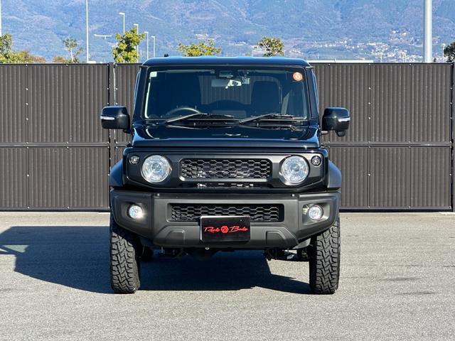 ジムニーシエラ ＪＣ　社外８型ナビＴＶ　Ｂカメラ　ショウワガレージリフトアップキット　ラテラルロッド　社外１６ｉｎＡＷ＆オープンカントリーＲ／Ｔタイヤ　社外テール＆グリル　シートヒーター　マッドフラップ　ブレーキサポート（12枚目）