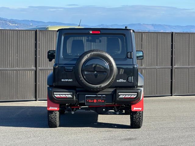 ジムニーシエラ ＪＣ　社外８型ナビＴＶ　Ｂカメラ　ショウワガレージリフトアップキット　ラテラルロッド　社外１６ｉｎＡＷ＆オープンカントリーＲ／Ｔタイヤ　社外テール＆グリル　シートヒーター　マッドフラップ　ブレーキサポート（13枚目）