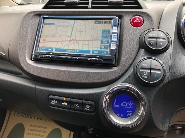 フィットシャトルハイブリッド 　／ナビ　フルセグＴＶ　バックカメラ　Ｂｌｕｅｔｏｏｔｈオーディオ　オートキセノンライト　ハーフレザーシート　シートヒーター　スマートキー２個　クルーズコントロール　ＥＴＣ（15枚目）