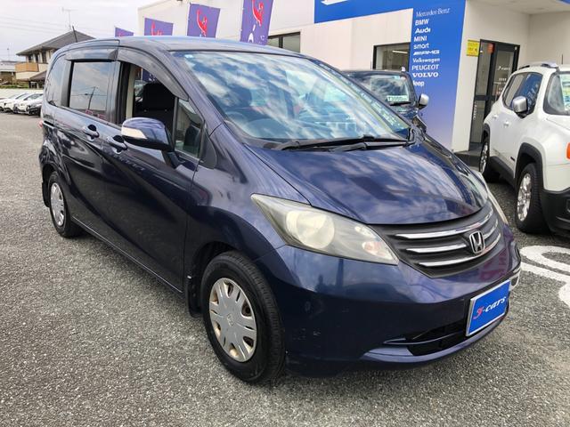 フリード Ｇ　ジャストセレクション　／ナビＴＶ　バックカメラ　両側パワースライド　オートキセノンライト　ＥＴＣ　２列目ウォークスルー　７人乗り　ワンオーナー　禁煙車（7枚目）