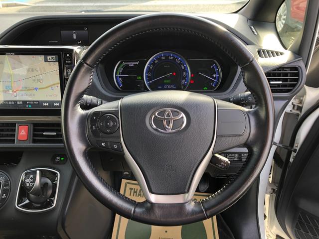 ヴォクシー ハイブリッドＶ　／１０インチナビ　バックカメラ　１２インチフリップダウンモニター　両側パワースライド　オートＬＥＤヘッドライト　シートヒーター　スマートキー　ＥＴＣ　Ｂｌｕｅｔｏｏｔｈオーディオ　クルーズコントロール（10枚目）