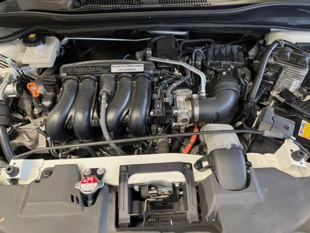 ヴェゼル ハイブリッドＲＳ・ホンダセンシング　純正８型ナビ　禁煙車　レーダークルーズ　レーンアシスト　シートヒーター　バックカメラ　ＬＥＤヘッド　純正１８インチアルミ　ハーフレザーシート　ＥＴＣ　スマートキー　Ｂｌｕｅｔｏｏｔｈ（18枚目）