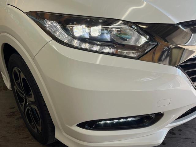 ヴェゼル ハイブリッドＺ・ホンダセンシング　禁煙車　純正ナビ　バックカメラ　レーダークルーズ　ＥＴＣ　シートヒーター　ホンダセンシング　スマートキー　純正革巻きステアリング　純正１７インチアルミ　ＬＥＤヘッドライト　ハーフレザーシート（14枚目）